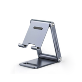Soporte para Teléfono Celular de Aluminio - Angulo Ajustable - Amplia Compatibilidad con dispositivos de 4.7'' a 7.9'' - Antideslizante - Antiarañazos - Plegable - Color Gris.