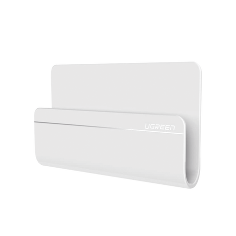 Soporte de Pared Adhesivo para Teléfono | Diseño de Montaje en Pared | Protección De Silicona Antideslizante | Anti Arañazos | Adhesivo 3M | Soporta Dispositivos 165*81*26.5 mm. | Caja De ABS | Color Blanco
